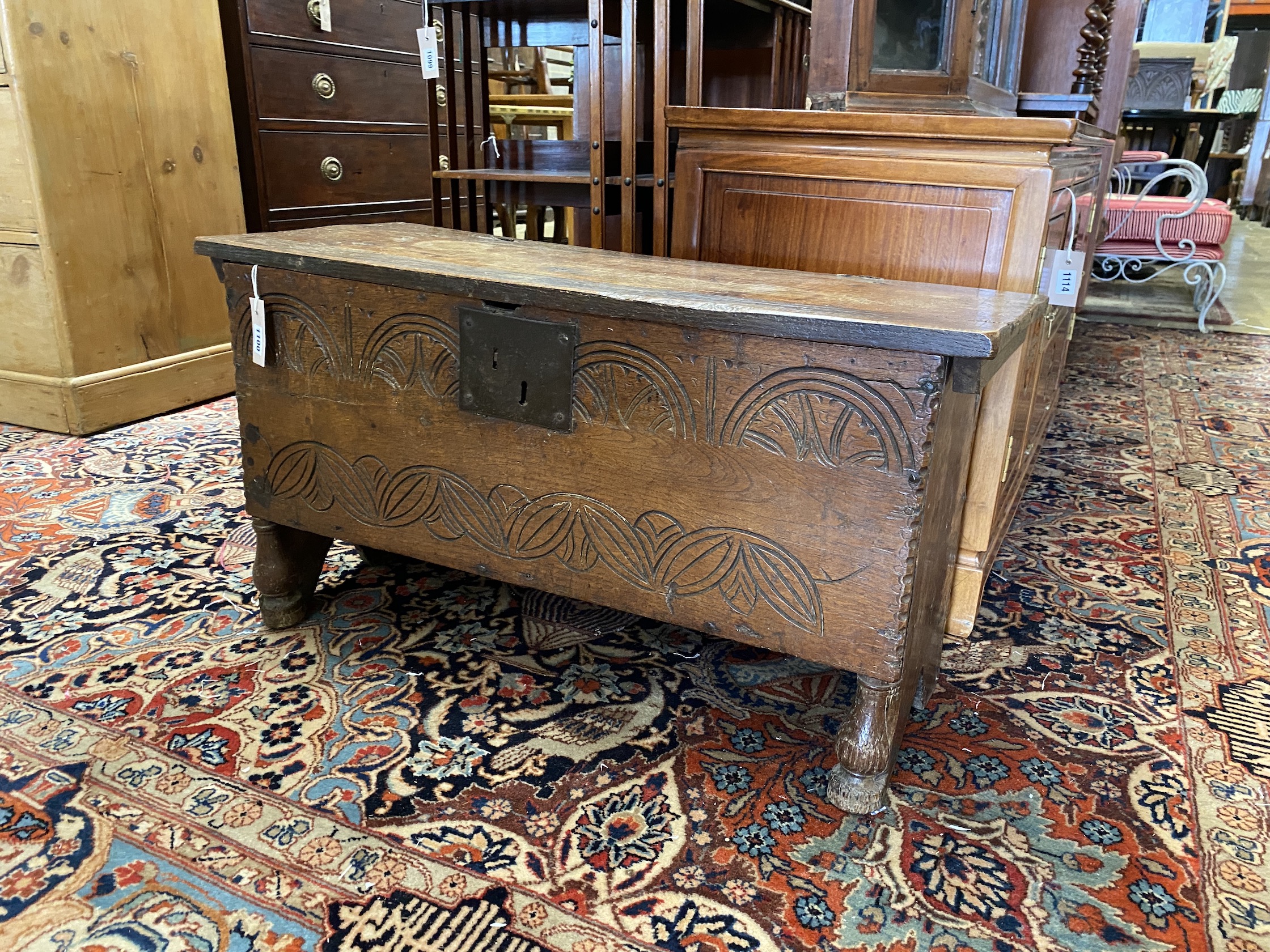 A small 17th and later carved oak coffer, width 84cm, depth 35cm, height 46cm